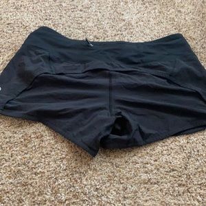 Black shorts. 2.5’